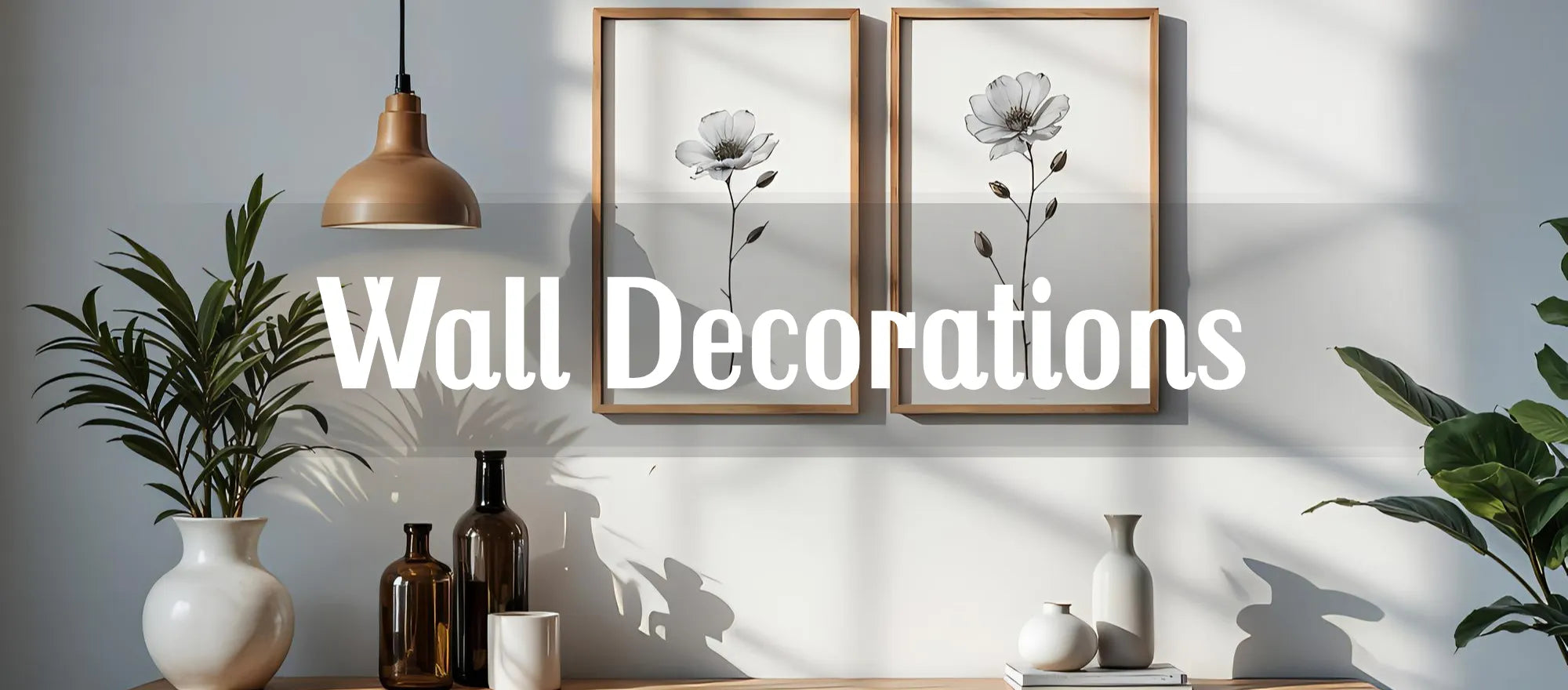 Minimalist black and white floral wall art set with two framed botanical prints hanging above a modern console table