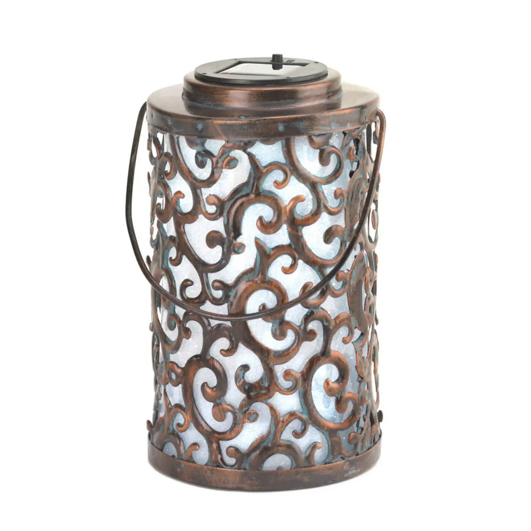 Decorative metal lantern with intricate patterns on a white background
