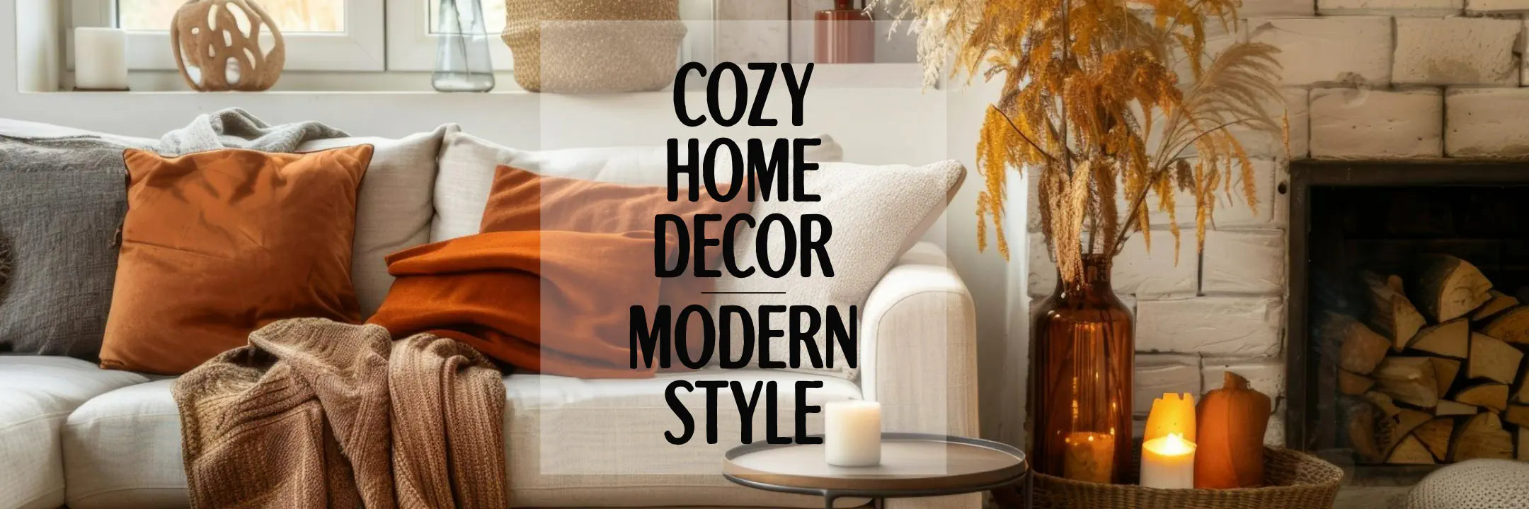 Cozy home decor with a couch, pillows, and candles in a living room setting.