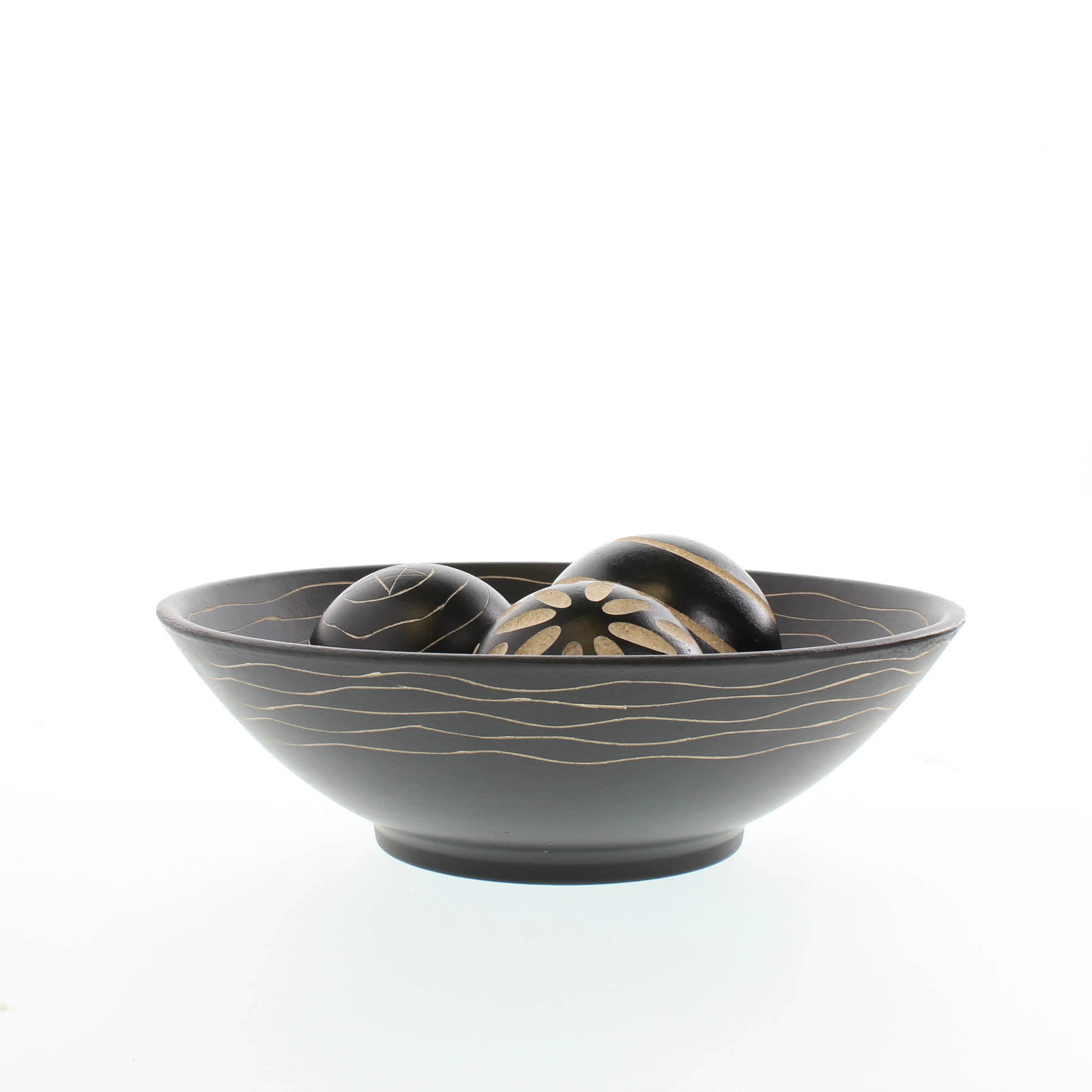 Wooden decorative bowl and matching black carved balls for home décor
