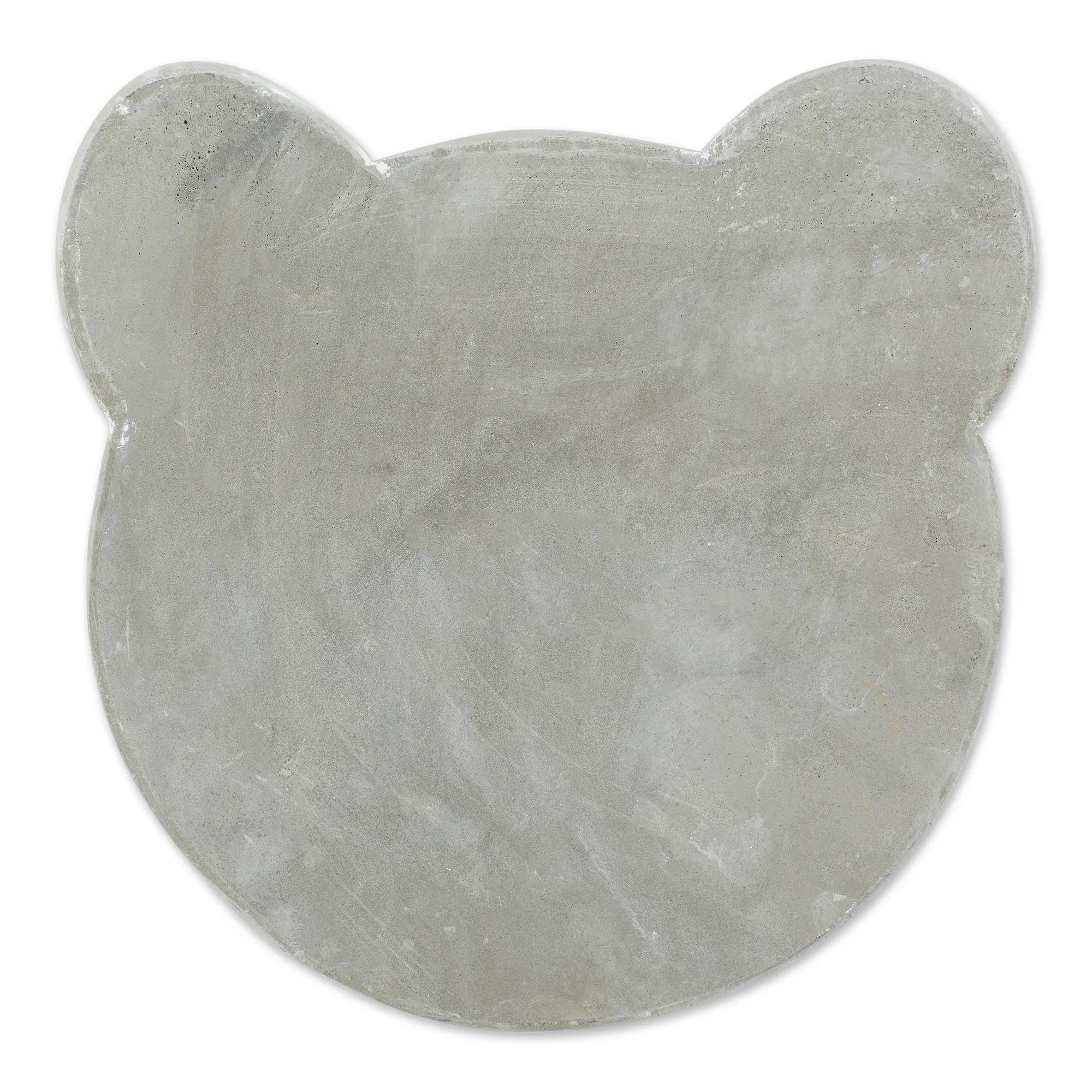 Rear view of dog memorial cement stepping stone