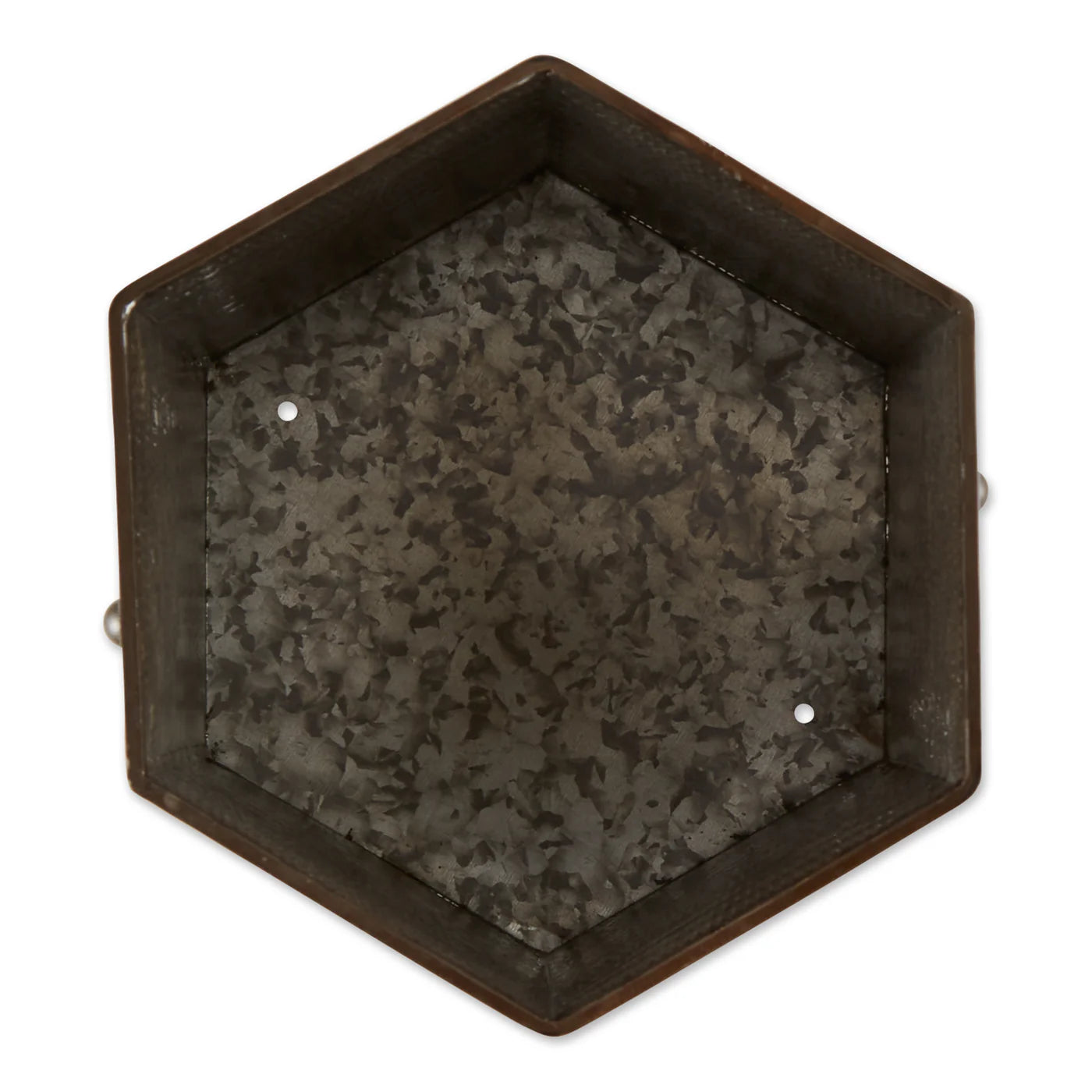 Hexagonal metal tray with rustic finish on a white background