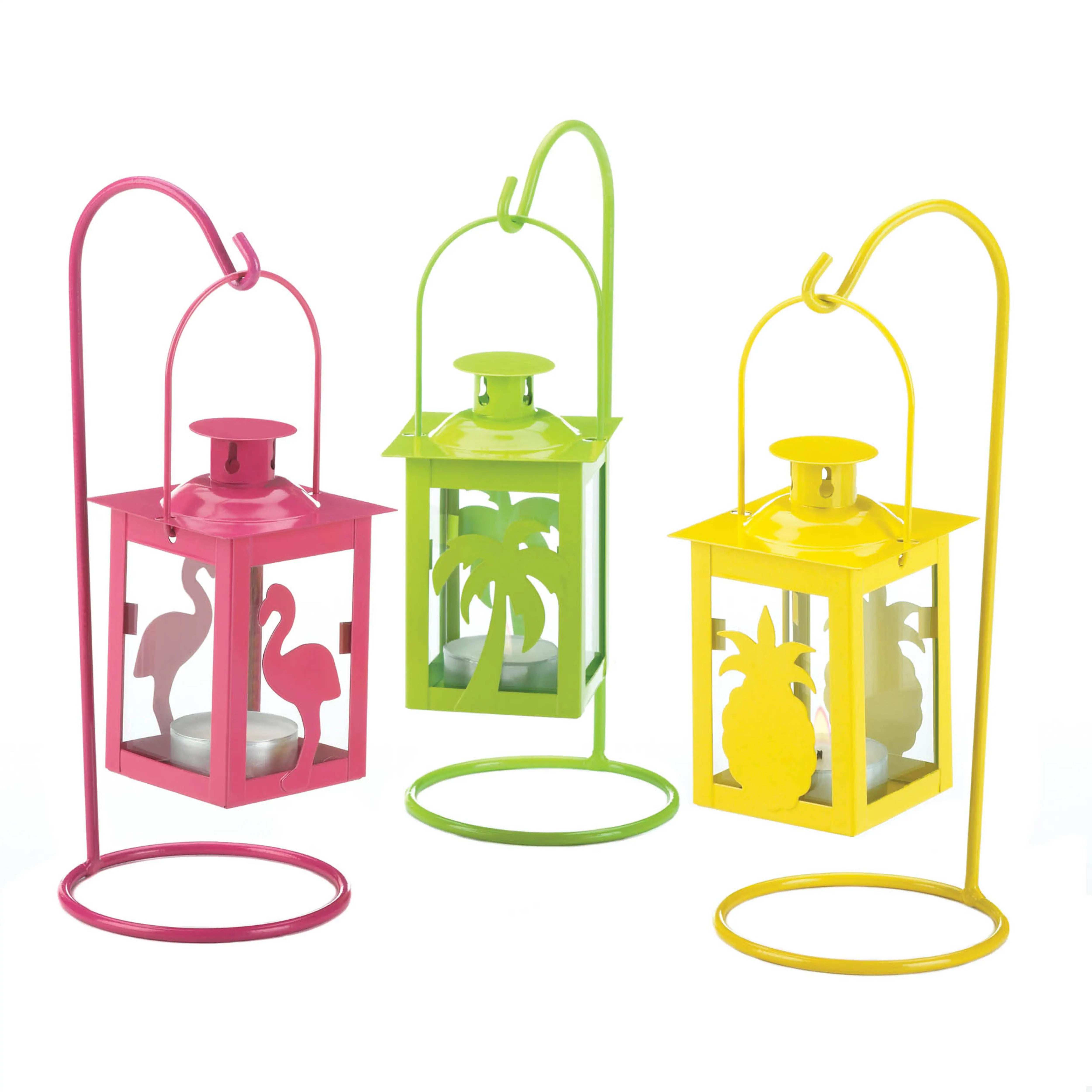 Three colorful lanterns with flamingo, pineapple, and palm tree designs on a white background.